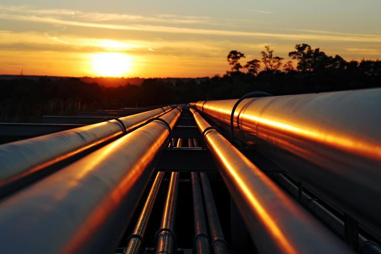 African pipelines in the sunrise (copyright by Shutterstock/Kodda)
