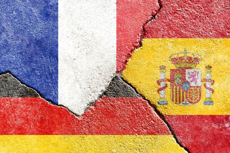 Flags of France, Spain & Germany on a wall (© Shutterstock/helloRuby)