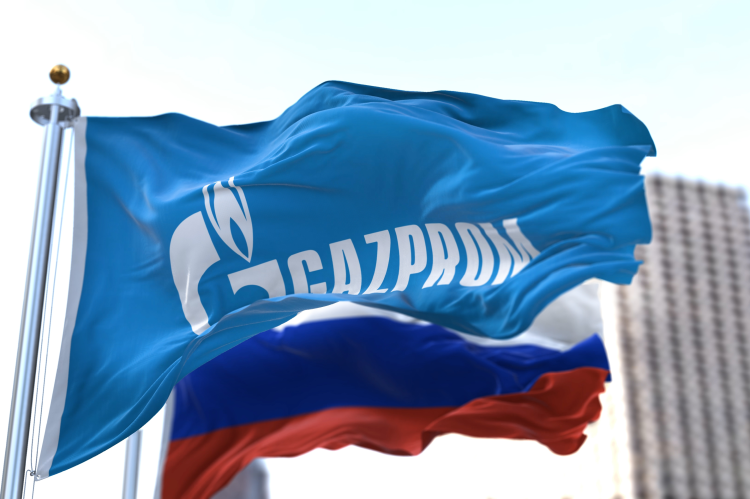 Flags of Gazprom and Russia flowing in the wind (© Shutterstock/rarrarorro)