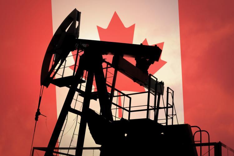 Oil pump on background of the flag of Canada (© Shutterstock/Anton Watman)