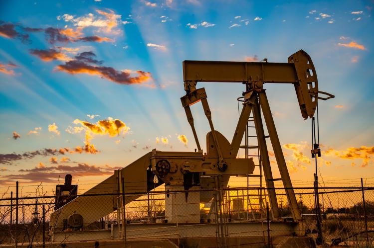 Pump sockets for the Permian basin at sunset (Copyright by Shutterstock/Mikki Shortes)