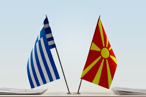 Flags of Greece and Northern Macedonia (copyright by Shutterstock/alexfan32)