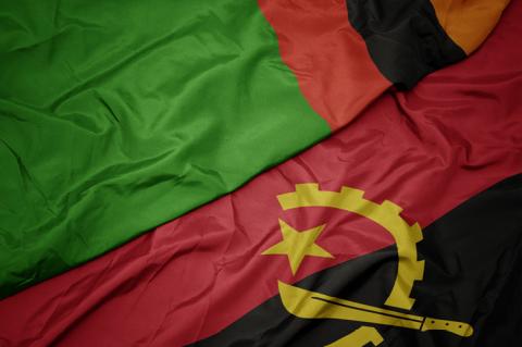 Flags of Zambia and Angola (copyright by Shutterstock/esfera)