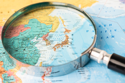 Japan & South Korea on the map under the magnifying glas (© Shutterstock/sasirin pamai)