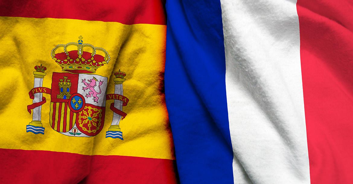 Flags of Spain and France (© Shutterstock/Aritra Deb)