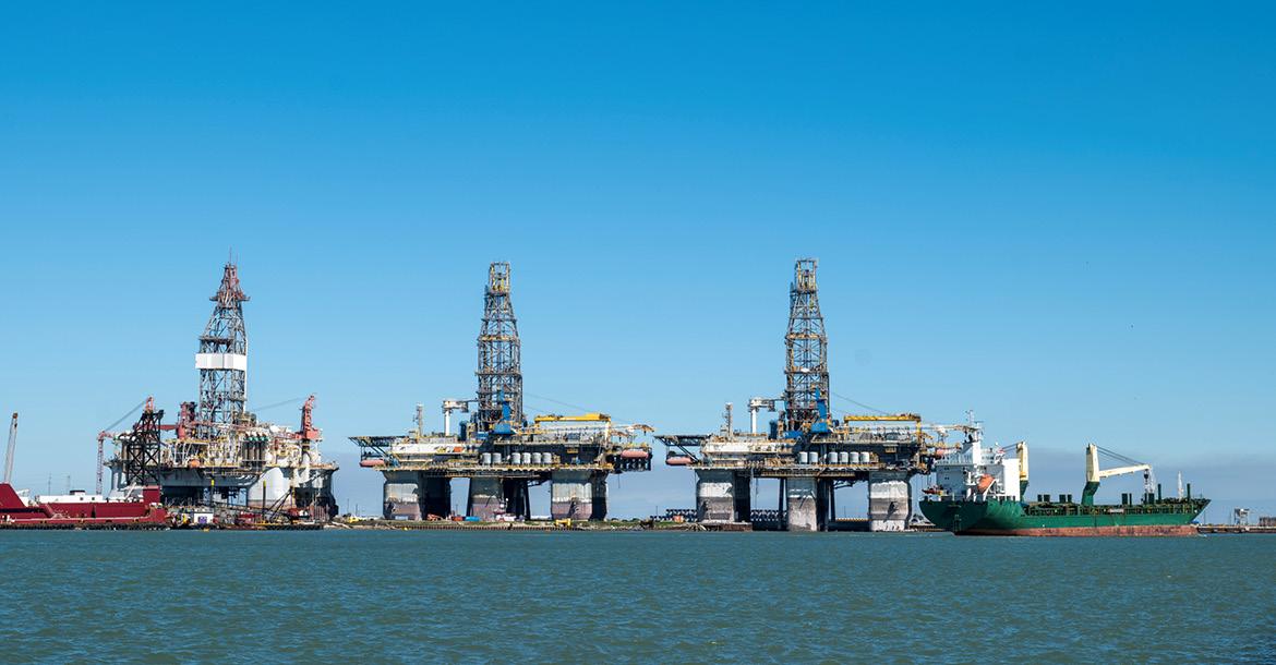 Three offshore oil platforms in dry dock in Port Aransas, Texas (© Shutterstock/Edgar Lee Espe)