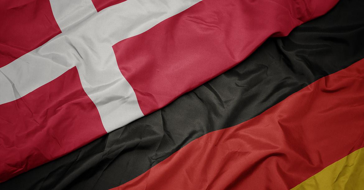 Waving flags of Denmark and Germany (© Shutterstock/esfera) 